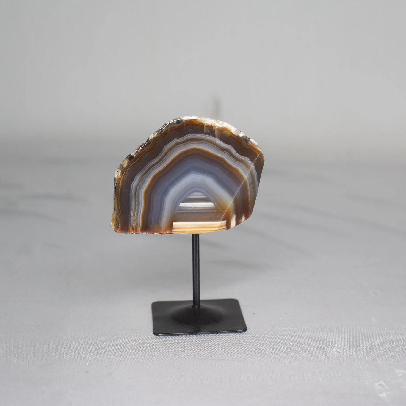 Rolled Agate on Black Metal Base